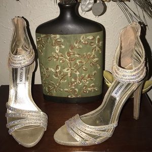 Embellished high heels.